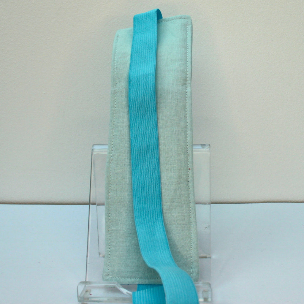 Reverse of handmade A4 fabric notebook pen pocket in Pale blue floral - light blue elastic — Dark Star Stitches