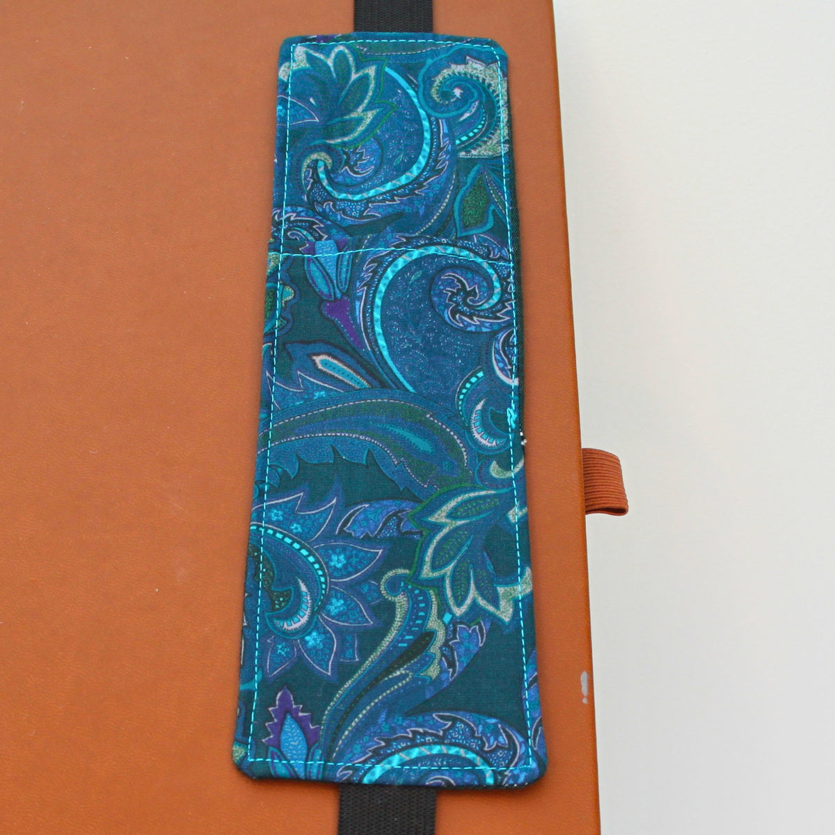 Handmade A4 fabric notebook pen pocket in Electric blue and pink Paisley - black elastic — Dark Star Stitches 