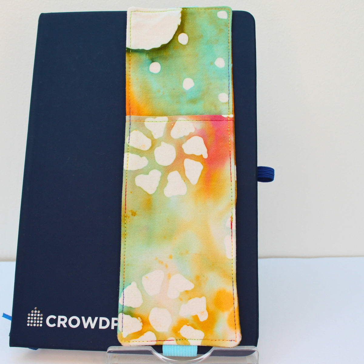 Handmade A5 fabric notebook pen pocket in tie dye with patterns fabric, light blue elastic — Dark Star Stitches