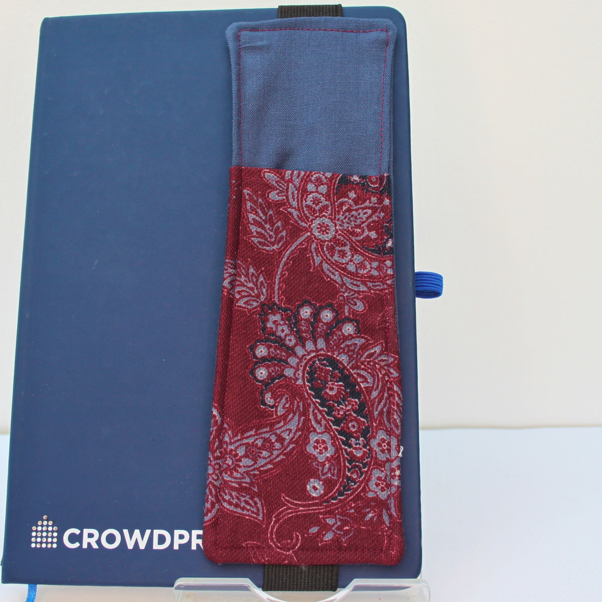 Handmade A5 fabric notebook pen pocket in burgundy and grey paisley pocket and back, black elastic — Dark Star Stitches
