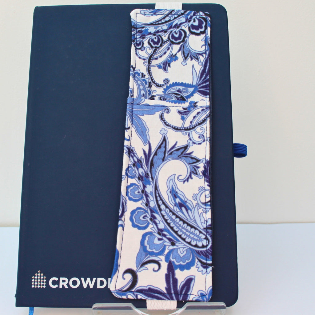 Handmade A5 fabric notebook pen pocket in blue paisley print with dark blue back, white elastic — Dark Star Stitches
