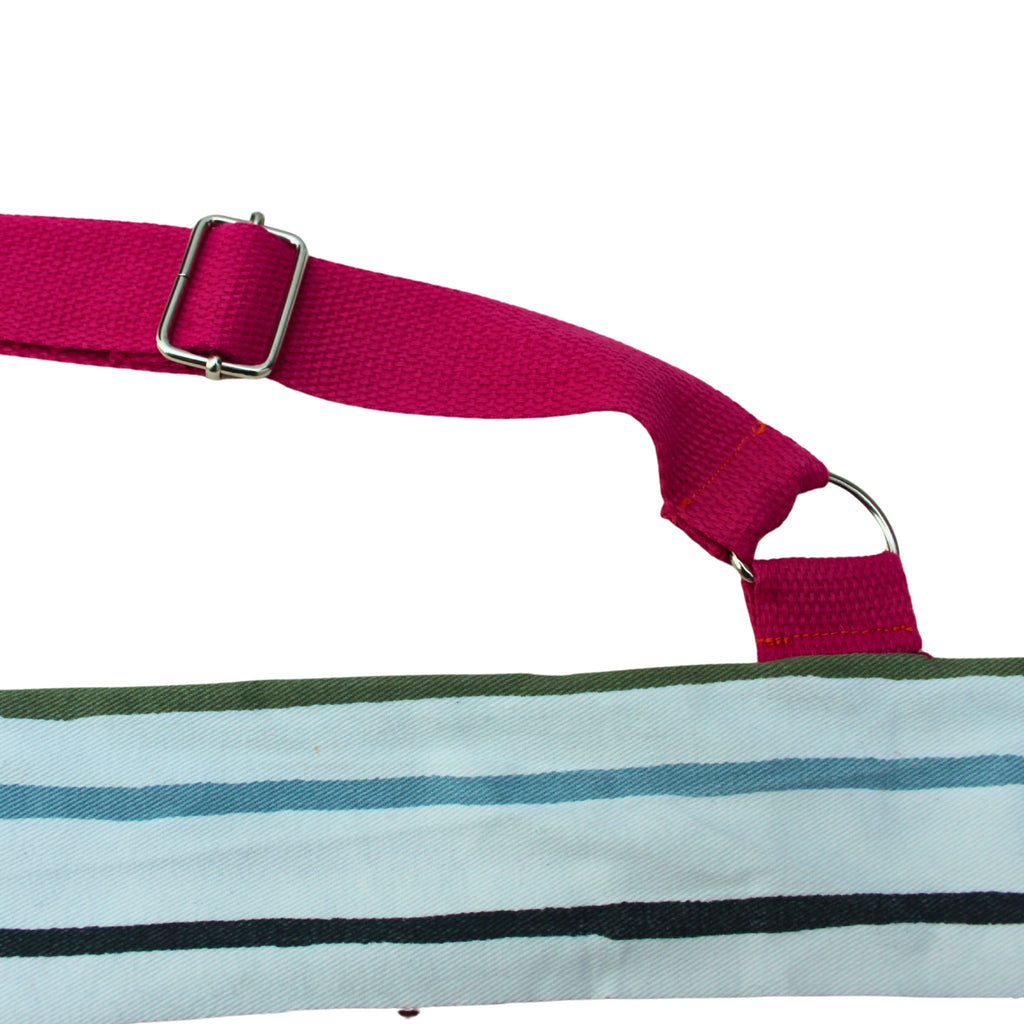Strap detail on handmade fabric baguette bag in multi-coloured stripes with pink straps — Dark Star Stitches