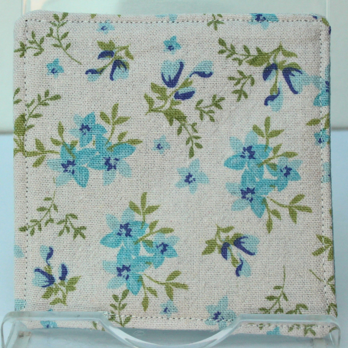 Reverse of handmade fabric bookmark in pale blue floral corner and back with pastel blue inner — Dark Star Stitches