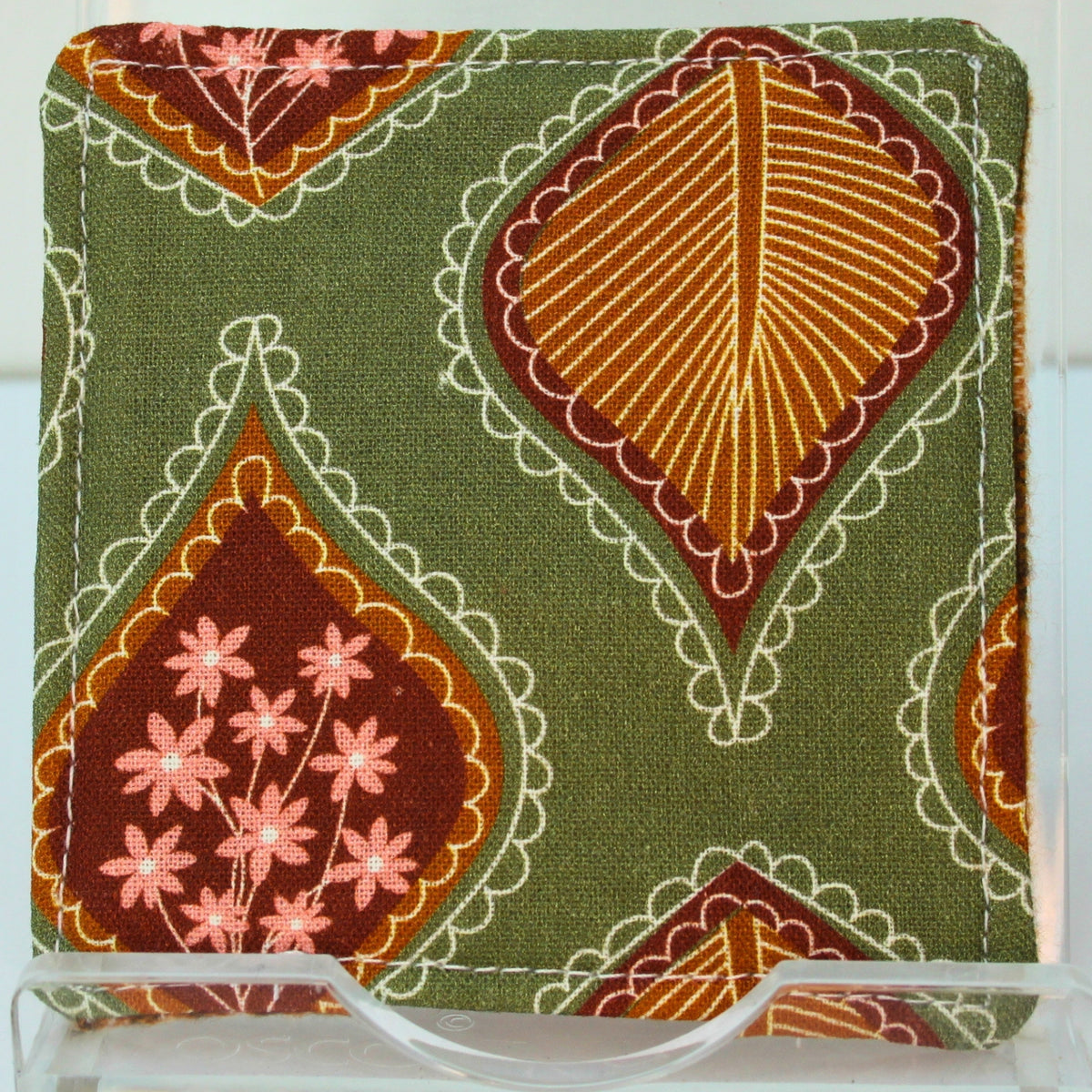 Reverse of handmade fabric bookmark in olive green large floral corner and back with orange tartan inner — Dark Star Stitches