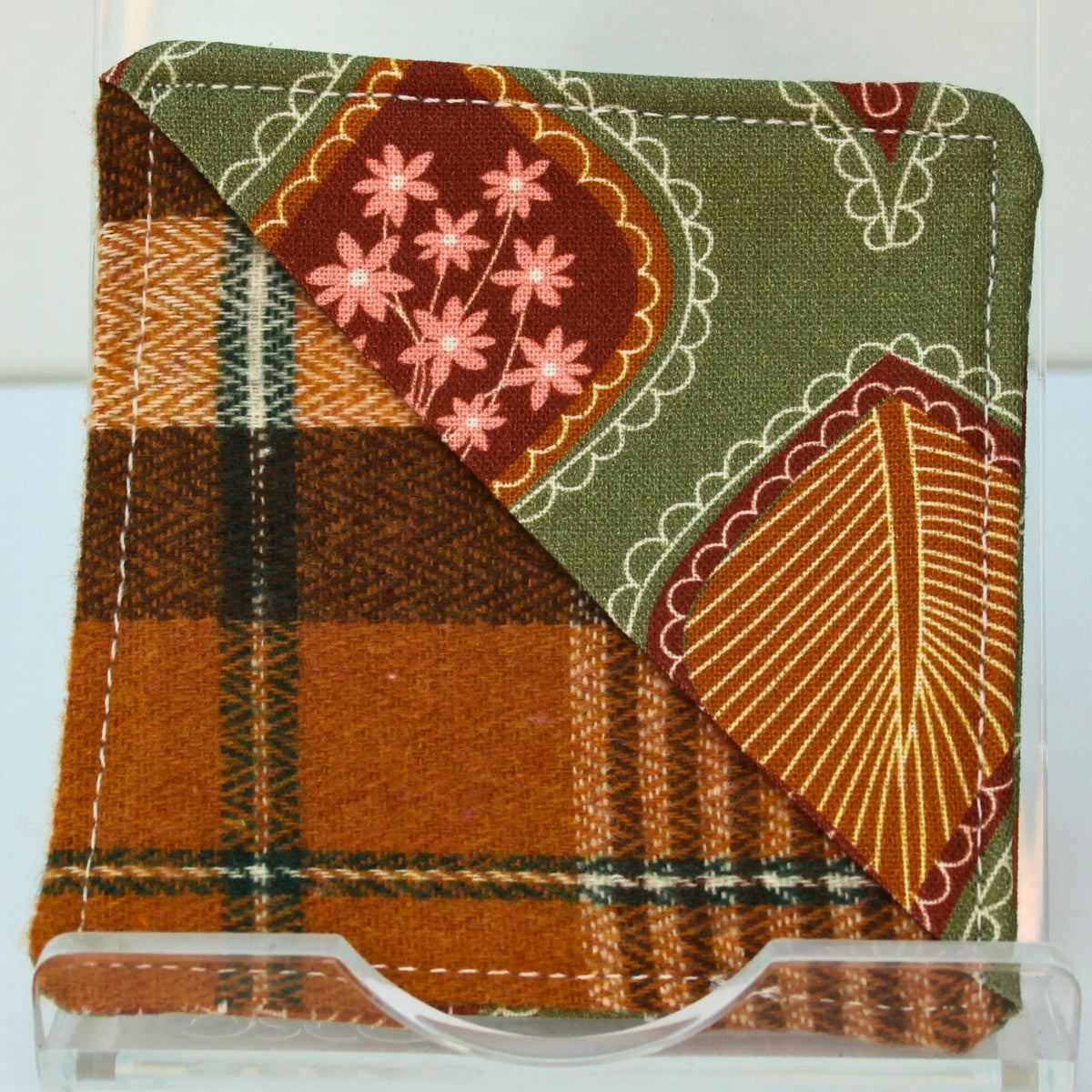 Handmade fabric bookmark in olive green large floral corner and back with orange tartan inner — Dark Star Stitches