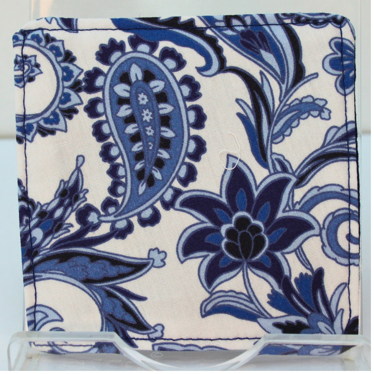 Reverse of handmade fabric bookmark in blue paisley print corner and back with dark blue inner — Dark Star Stitches