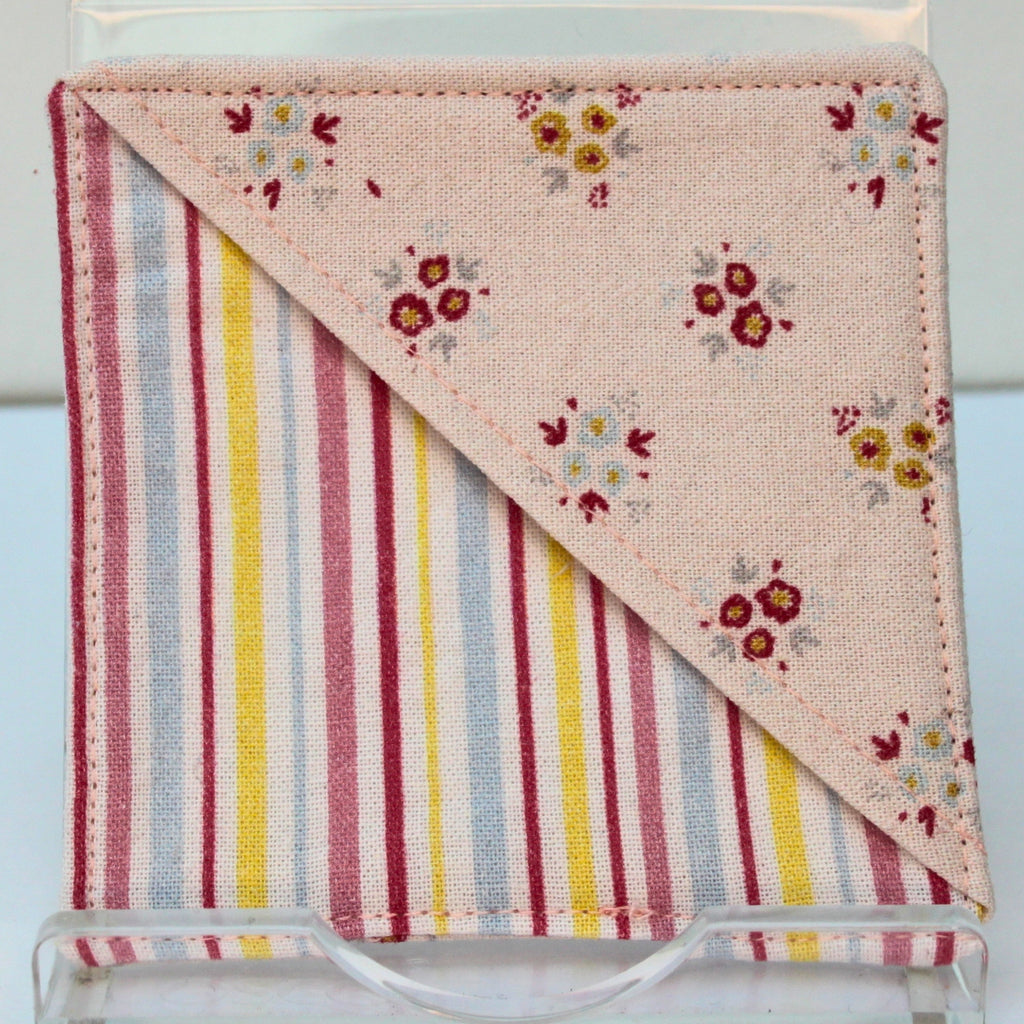 Handmade fabric bookmark in pale pink floral corner and back with candy stripe inner — Dark Star Stitches