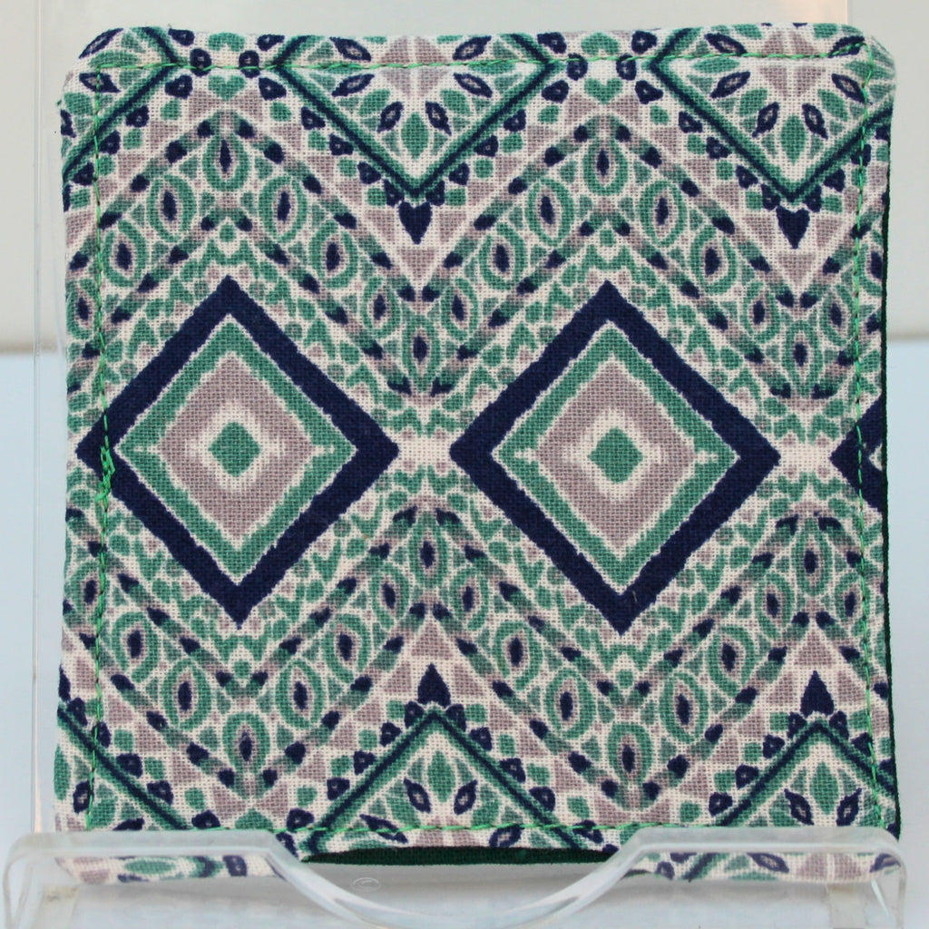 Reverse of handmade fabric bookmark in green/blue/grey diamond pattern corner and back with dark green inner — Dark Star Stitches