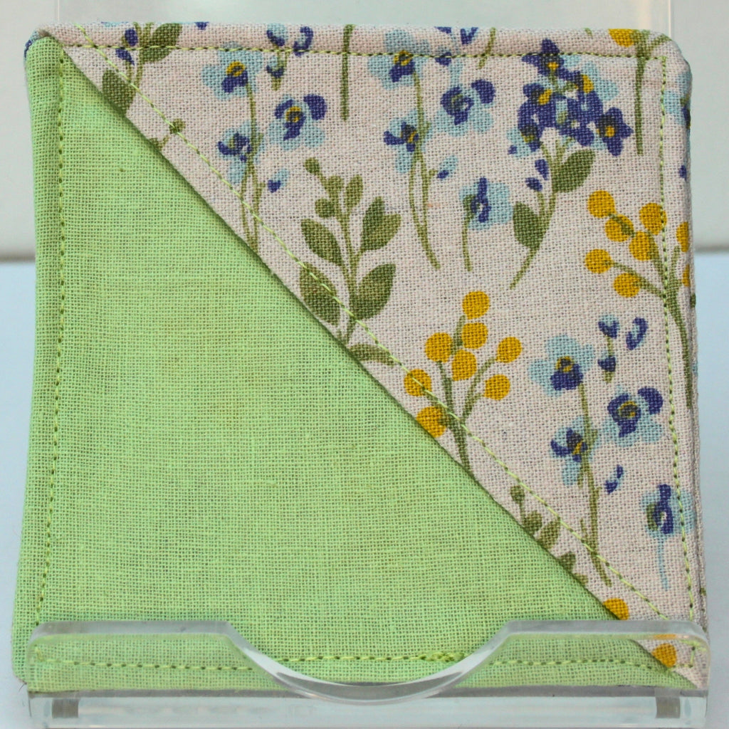 Handmade fabric bookmark in pale blue and yellow florals on white corner and back with pale green inner — Dark Star Stitches