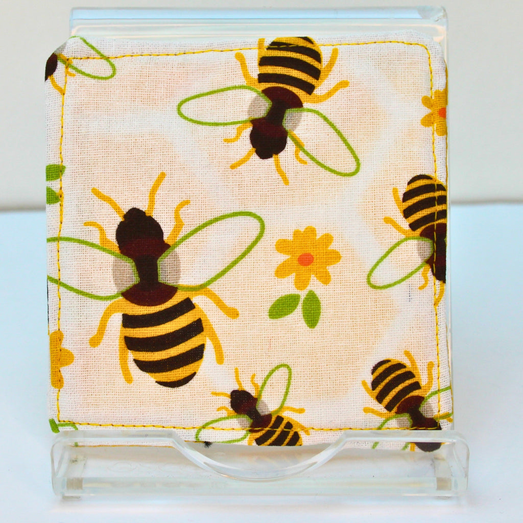Reverse of handmade fabric bookmark in bees with green wings corner and back with yellow honeycomb inner — Dark Star Stitches