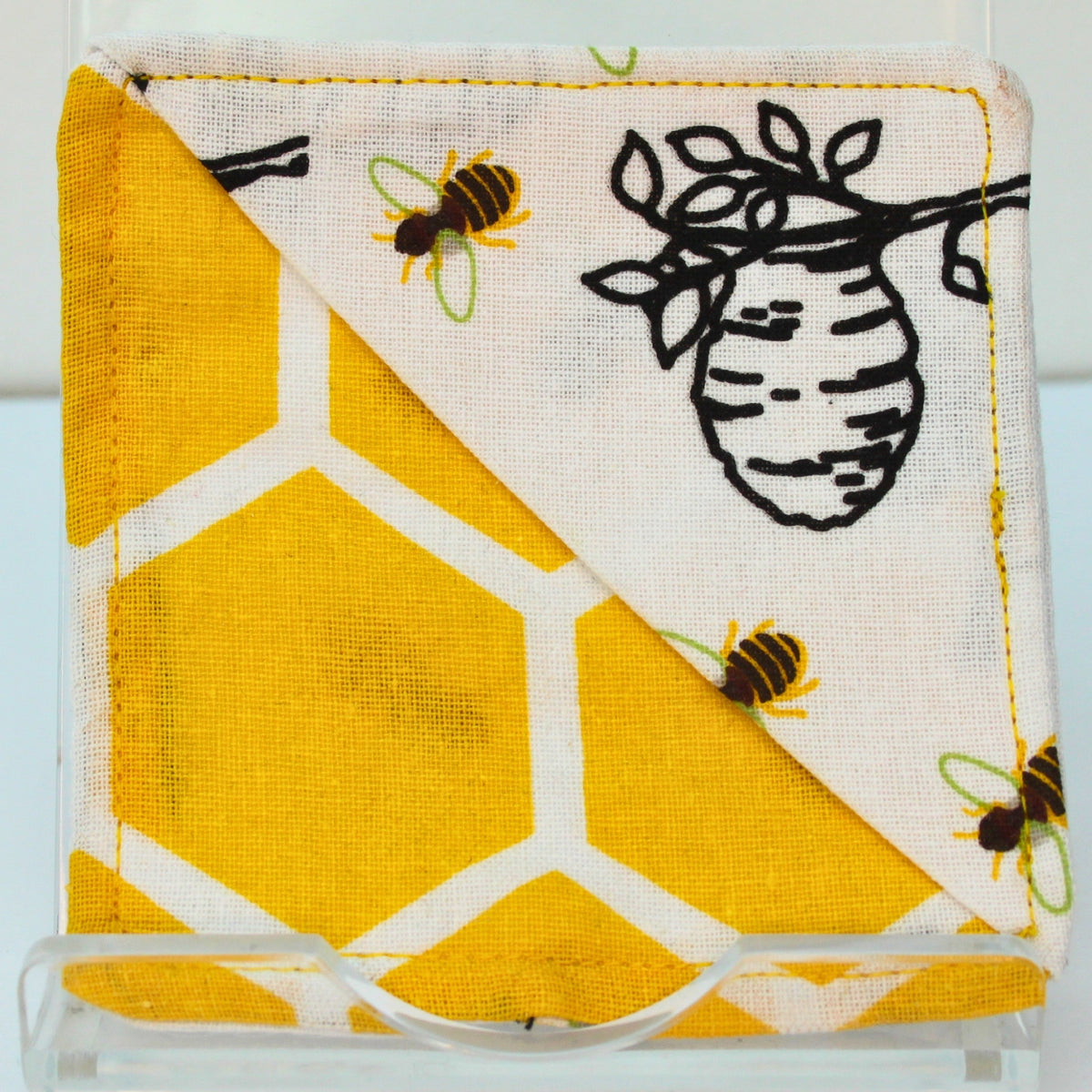 Handmade fabric bookmark in bee and beehive on white corner and back with yellow honeycomb inner — Dark Star Stitches