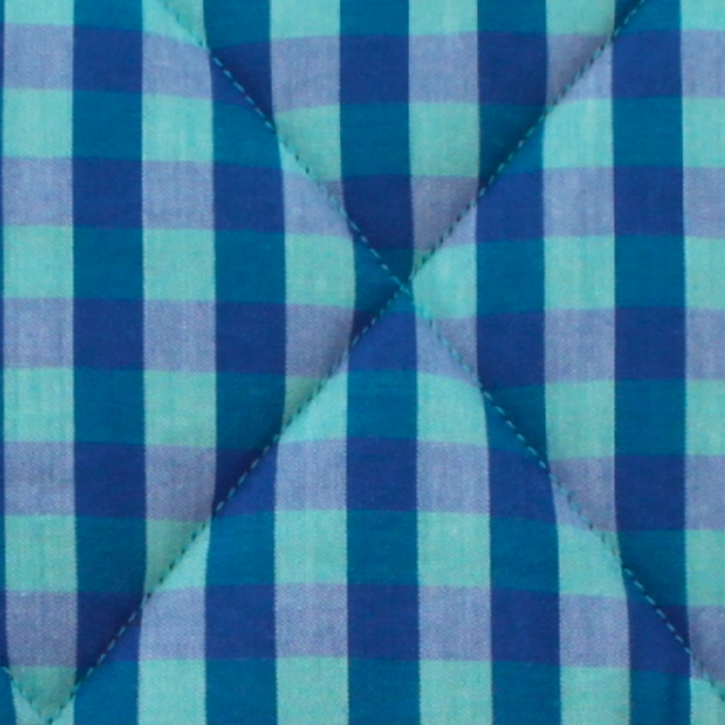 Close-up of light and dark blue check pattern on cotton fabric used in handmade quilted booksleeve set — Dark Star Stitches
