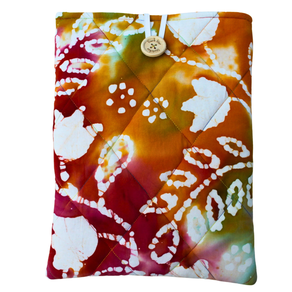 Quilted handmade booksleeve in tie dye patterned fabric with front pocket — Dark Star Stitches