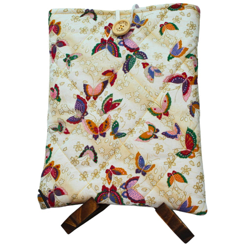 Quilted handmade booksleeve in multi-coloured butterfly cream fabric with front pocket — Dark Star Stitches