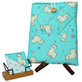 Handmade booksleeve set with cartoon alpacas on bright blue cotton fabric, including quilted booksleeve and fabric bookmark