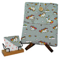 Handmade booksleeve set with cartoon unicorns on grey cotton fabric, including quilted booksleeve and fabric bookmark