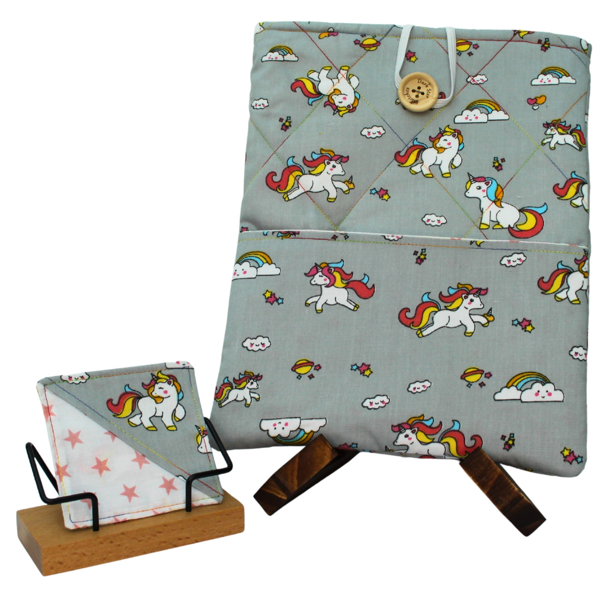 Handmade booksleeve set with cartoon unicorns on grey cotton fabric, including quilted booksleeve and fabric bookmark
