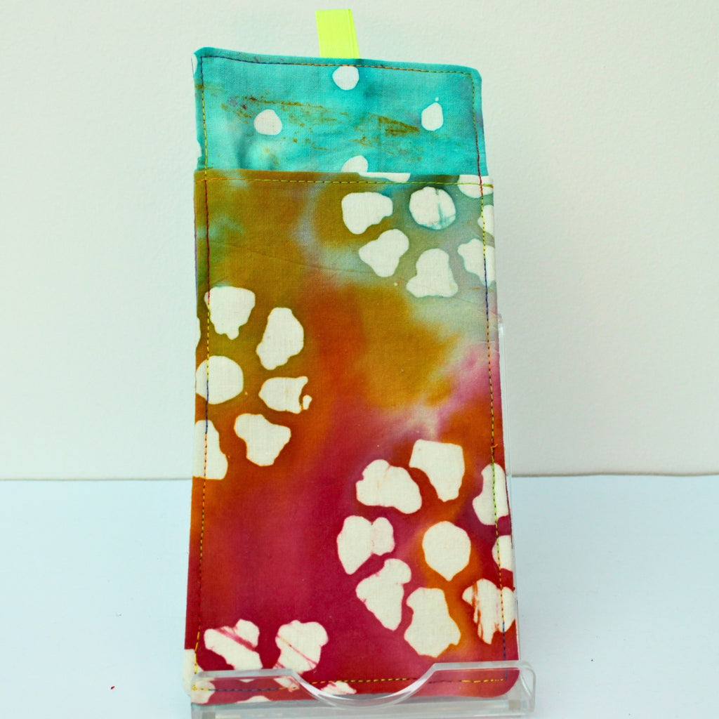 Reverse of handmade double sided lanyard pocket in tie dye with patterns fabric, hi vis green ribbon — Dark Star Stitches