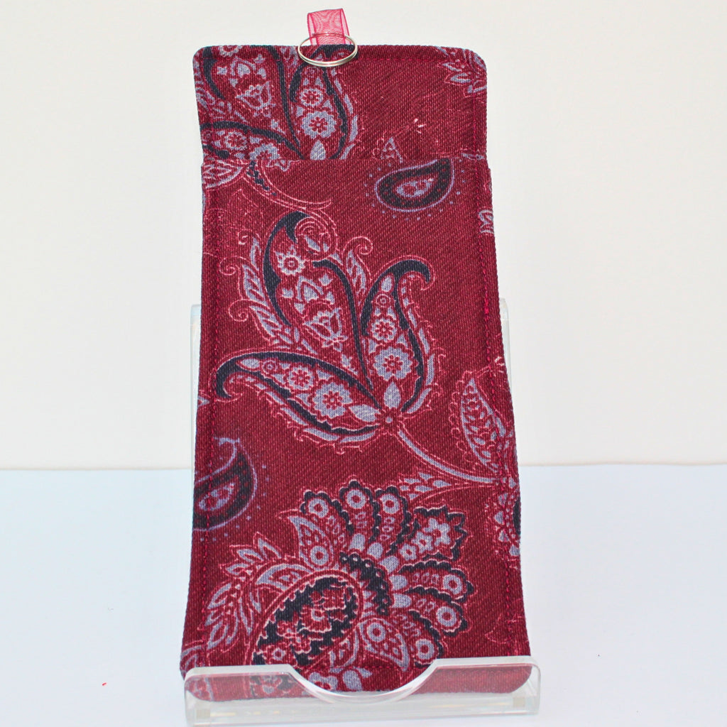 Reverse of handmade double sided lanyard pocket in burgundy and grey paisley with inner lining fabric, burgundy ribbon — Dark Star Stitches