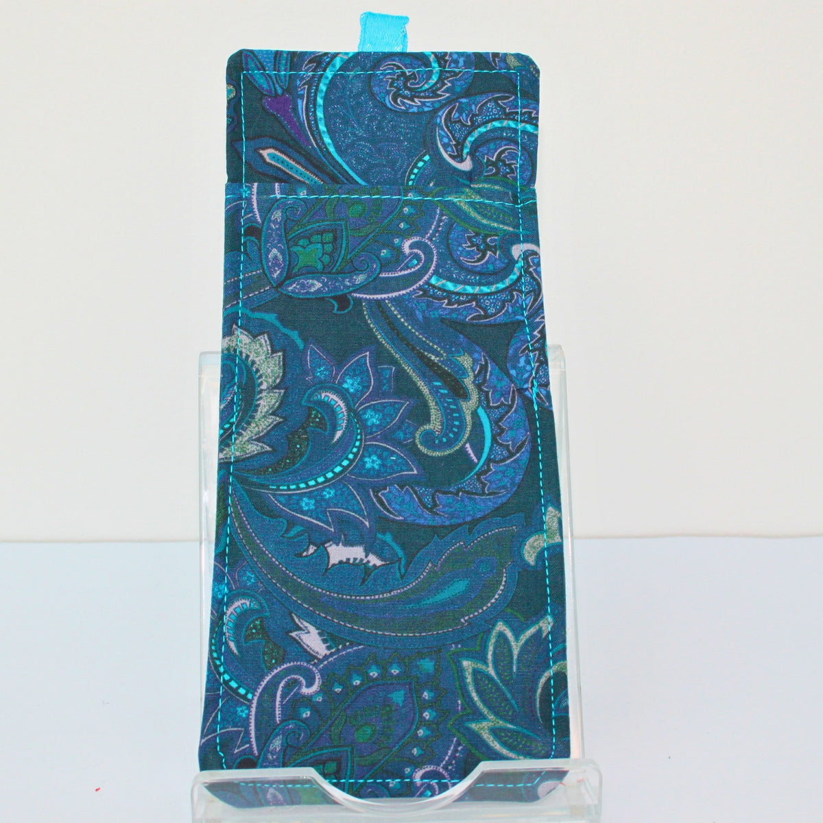 Handmade double sided lanyard pocket in electric blue and pink paisley on green fabric, electric blue ribbon — Dark Star Stitches