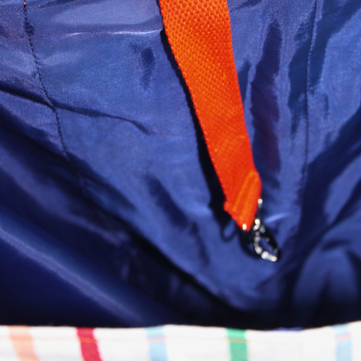 Blue lining inside handmade fabric tote bag with hat holder in multi-colour stripes — Dark Star Stitches
