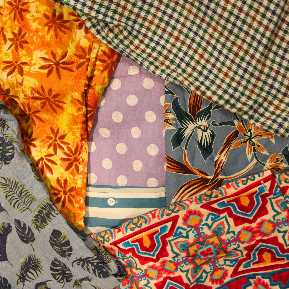 Close-up of colourful pre-loved fabric swatches including floral, polka dot, gingham and tropical prints — Dark Star Stitches Second Chapter upcycled fabric collection